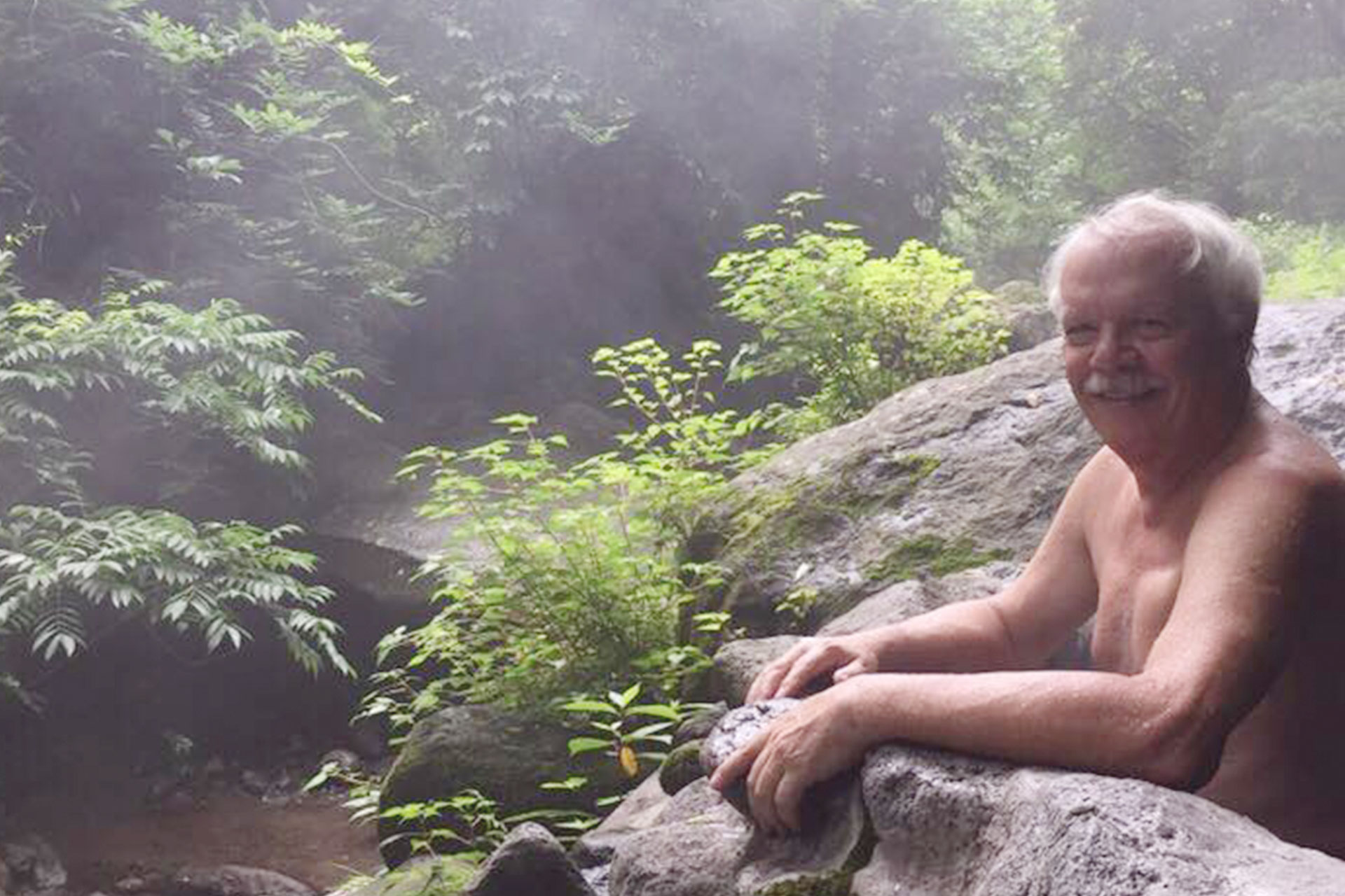 foreign man enjoying Beppu Onsen